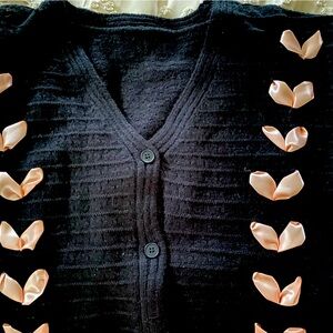 Cute Black Cardigan with pink satin ribboning down sleeves and front. Cider.